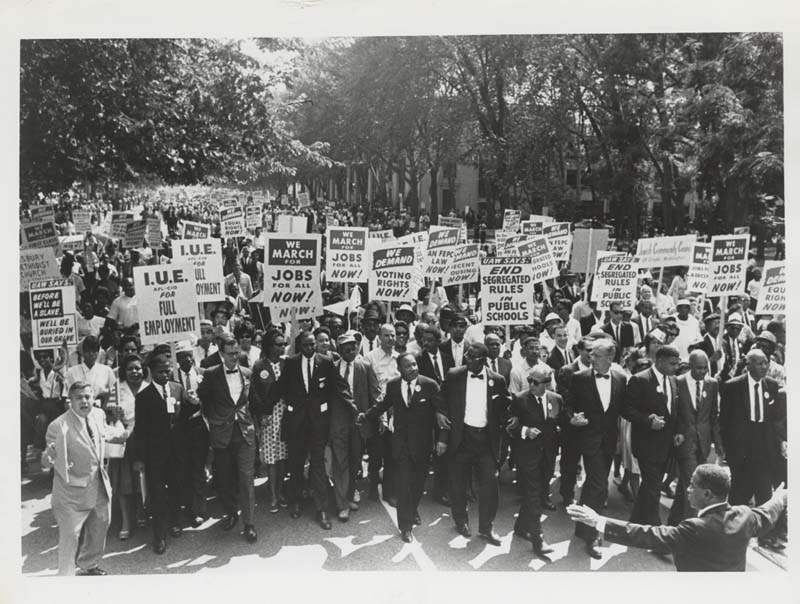 Thousands of peaceful protestors march for equality in Washington during the civil rights movement.