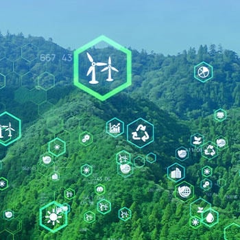 Image showing mountains and tree with icons layered showing different types of sustainable energy